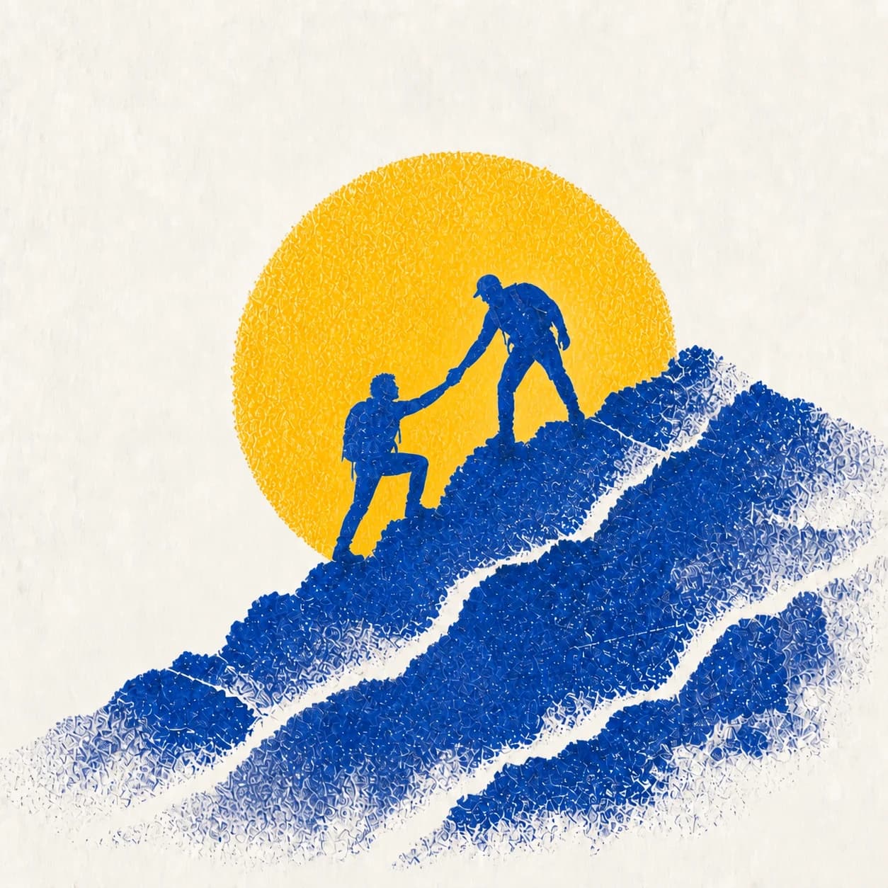 Two people helping one another climb a mountain ridge